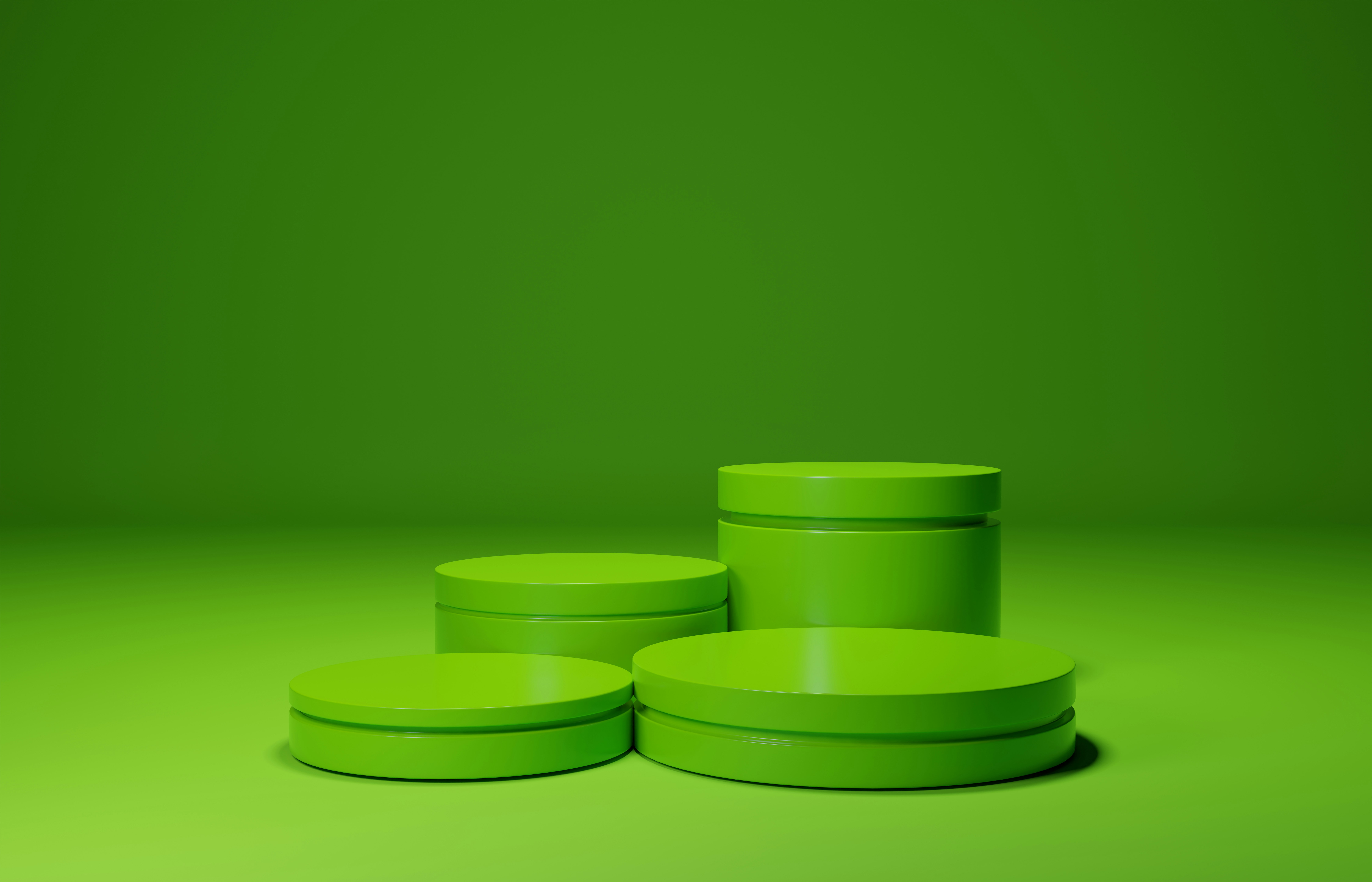 A group of green containers sitting on top of a green floor